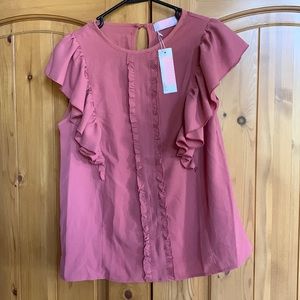 Woman’s Corel colored ruffle blouse size small